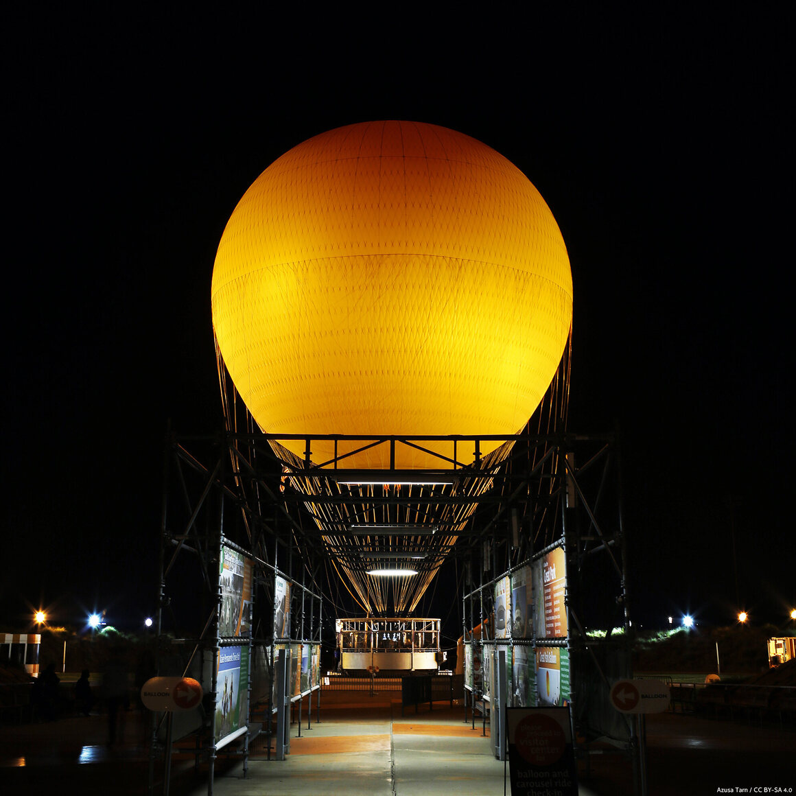 Irvine's great orange balloon, roosting on land before its next sky-high journey.